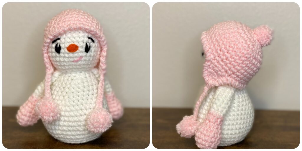 a snowgirl made with a free snowman crochet pattern