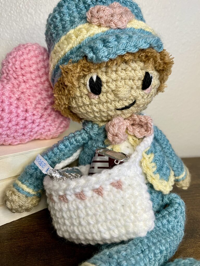 crocheted valentine boy with bag to hold goodies