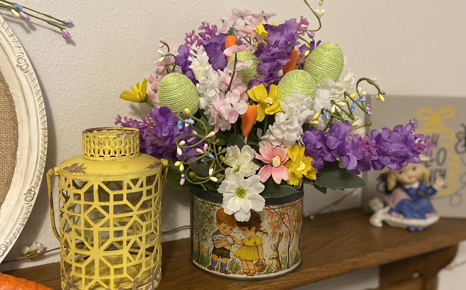 vintage candy tin used for a flower arrangement