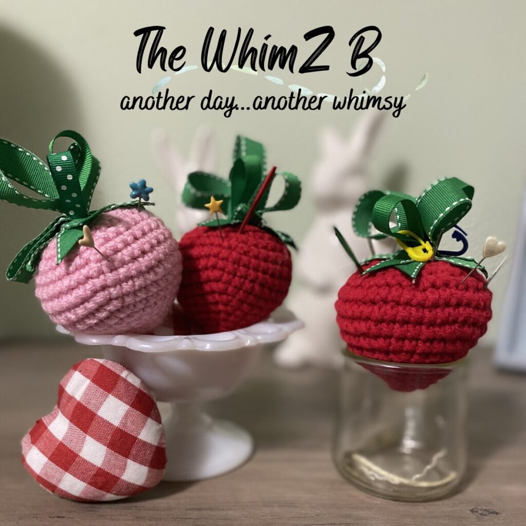 crocheted strawberries with ribbon tops. free crochet pattern by the WhimZ B