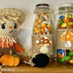 fall themed candy jars made by repurposing a Starbucks Frappuccino bottle