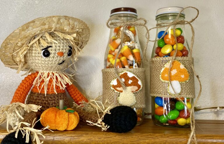 fall themed candy jars made by repurposing a Starbucks Frappuccino bottle